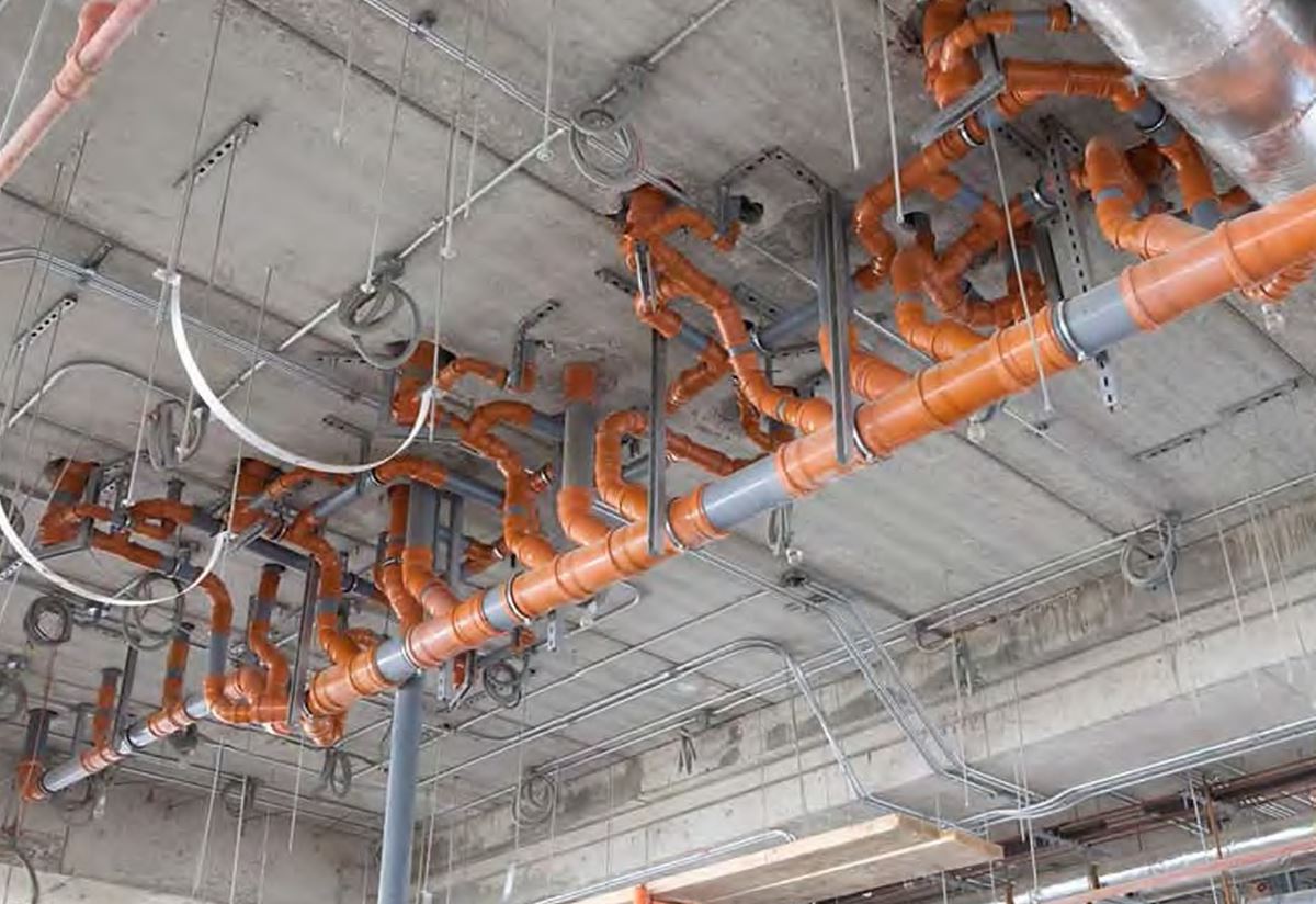 Drainage pipework installed below a concrete slab